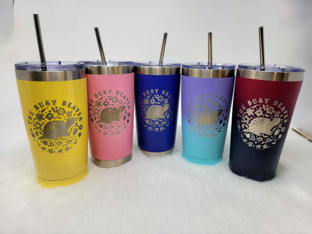 Five tumblers in yellow, pink, blue, aqua and red-to-navy, engraved with a round beaver logo