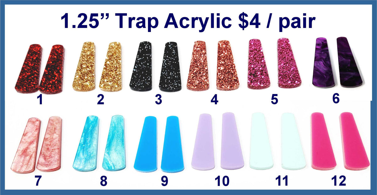 Twelve pairs of 1.25 inch contour-cut acrylic trapezoid cabochons (cabs) in glitter, marbled and solid colours