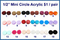 Eighteen pairs of 1/2 inch round acrylic cabochons (cabs) in glitter, marbled and solid colours