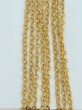 Hanging strands of 1.5 x 2mm gold stainless steel link chain