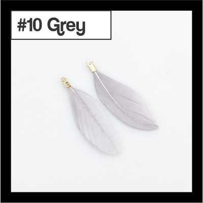 Pair of 4.5cm grey feather tassels with gold-tone caps, labelled #10
