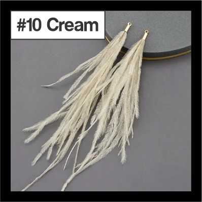 Pair of 14cm cream feather tassels with gold connectors, labelled #10 Cream