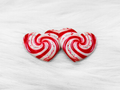 Pair of 37mm resin heart cabochons (cabs) with a red and white peppermint candy swirl