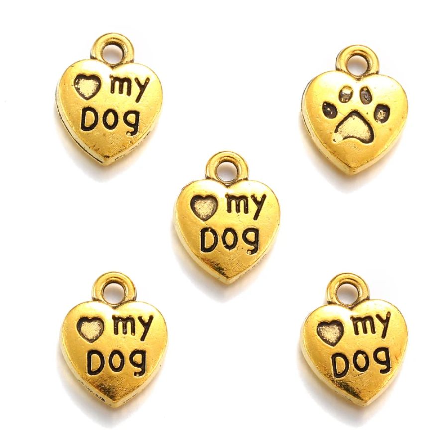 Four gold-tone heart charms reading 'I love my dog' with a paw print on the back