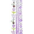 Four strands of Crystal Lane glass beads with flower, leaf and faceted round beads in an ombre purple mix