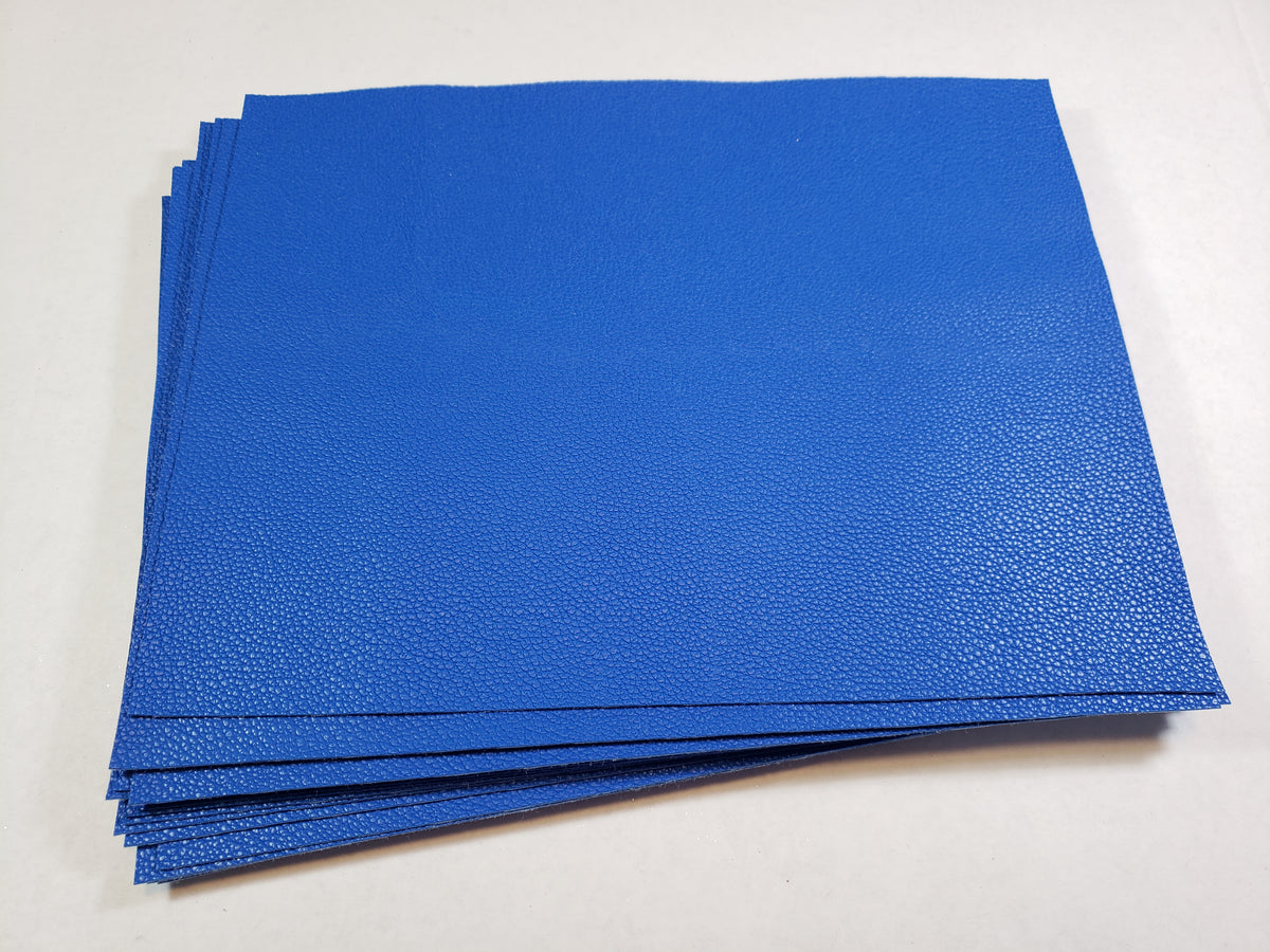 Stack of #11 cobalt blue faux leather sheets with a pebbled grain texture