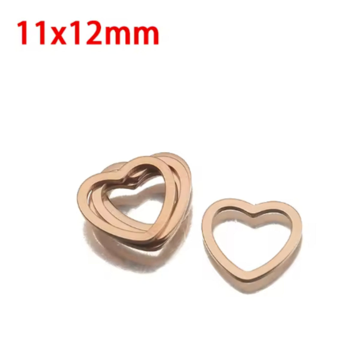 Pile of rose gold stainless steel open heart bezel frames, labelled 12 x 11mm