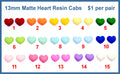 Fifteen pairs of 13mm matte resin heart cabochons (cabs) in reds, yellows, greens, blues, pinks and purple