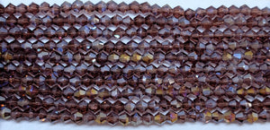 4mm Glass Bicone, Transparent Mauve AB
