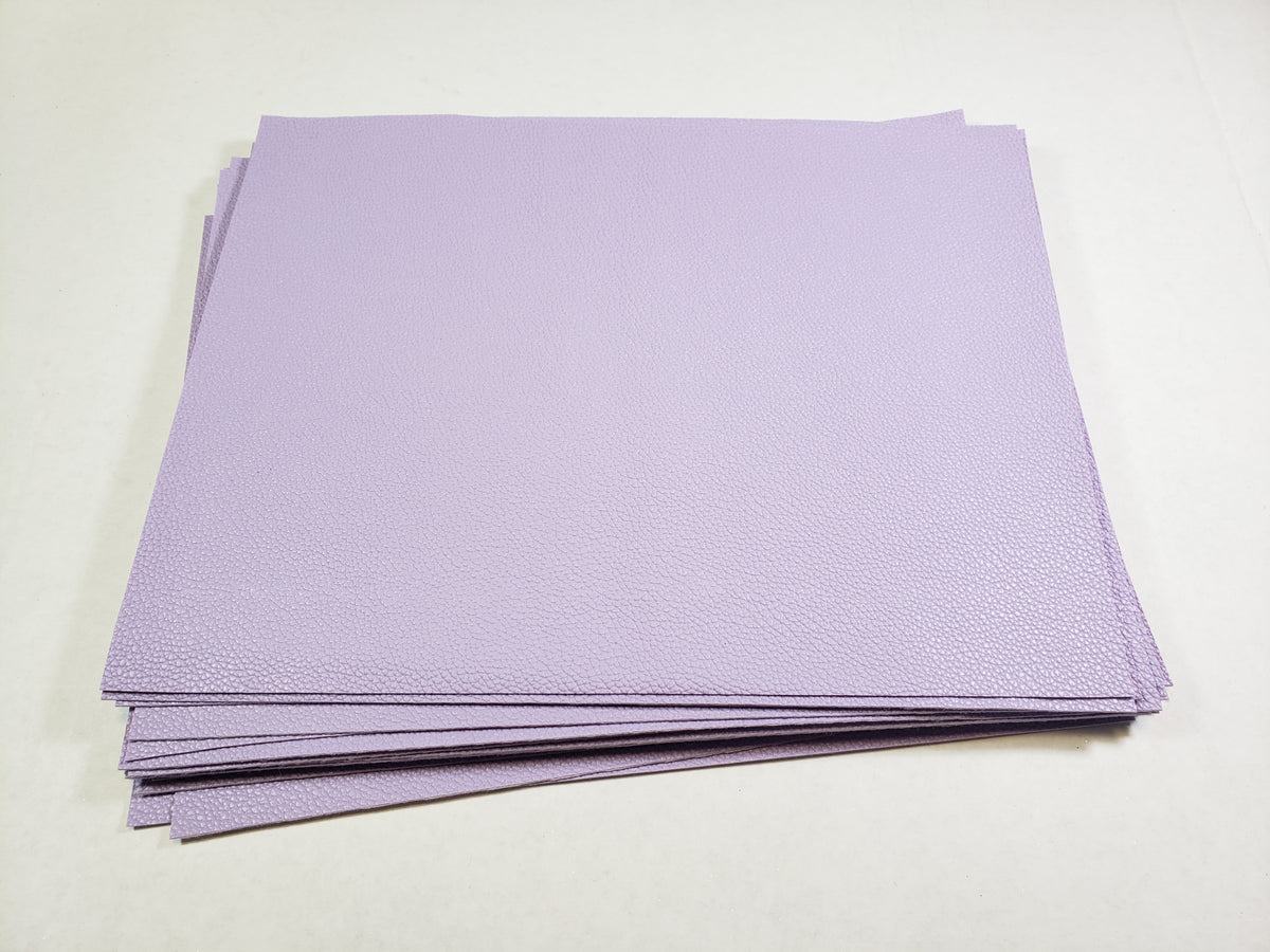 Stack of #14 lilac faux leather sheets with a pebbled grain texture