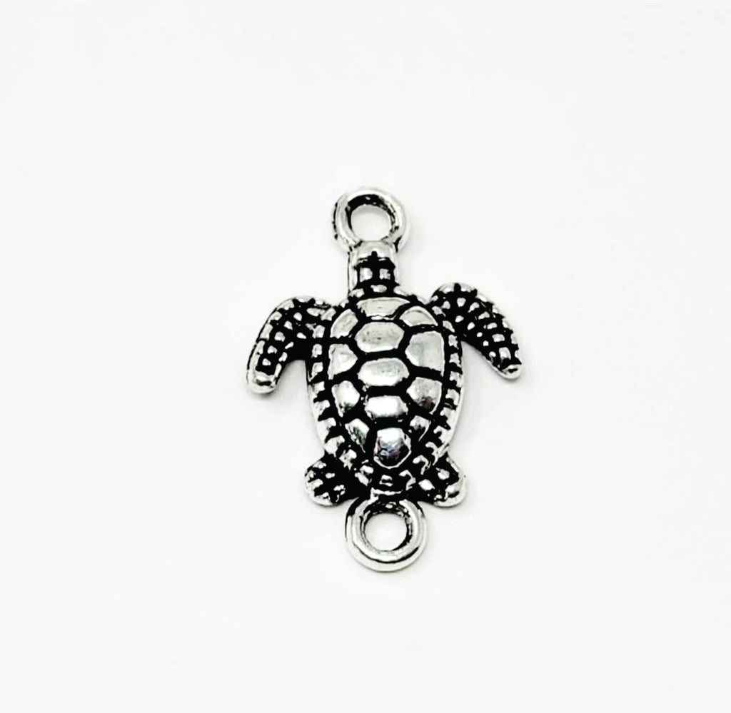 Silver-tone 14 x 21mm turtle connector with a loop at the head and tail