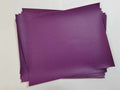 Stack of #15 purple faux leather sheets with a pebbled grain texture