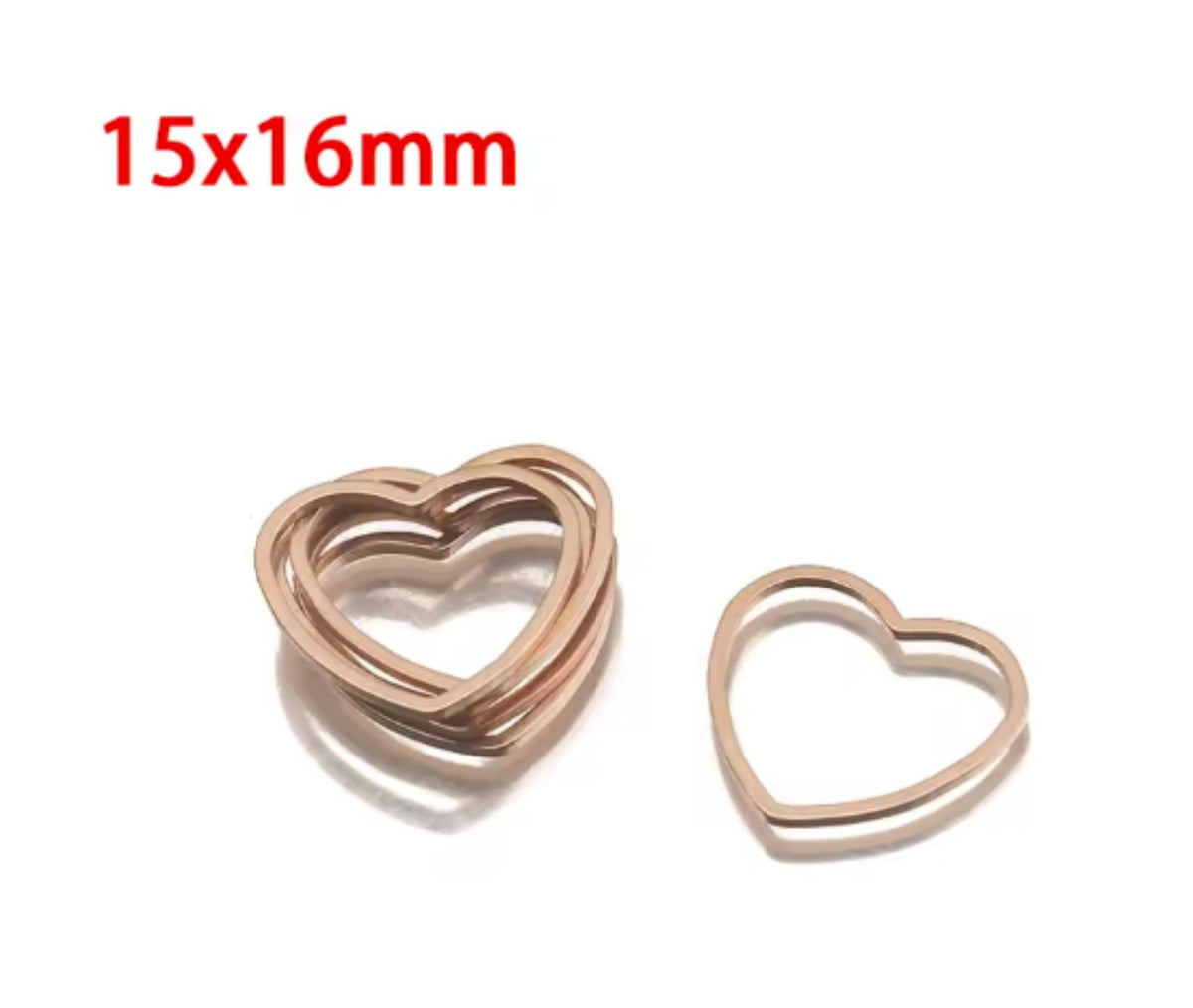 Pile of rose gold stainless steel open heart bezel frames, labelled 16 x 15mm