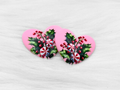 Pair of 37mm resin heart cabochons (cabs) in pink with holly, berries and peppermint candies