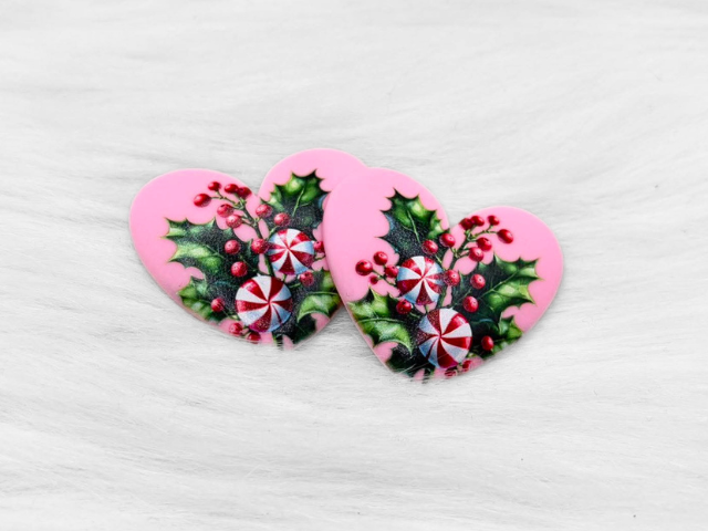 Pair of 37mm resin heart cabochons (cabs) in pink with holly, berries and peppermint candies