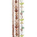 Four strands of Crystal Lane glass beads with flower, leaf and faceted round beads in a brown mix