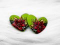 Pair of 37mm resin heart cabochons (cabs) in lime green with a red poinsettia and gold accents
