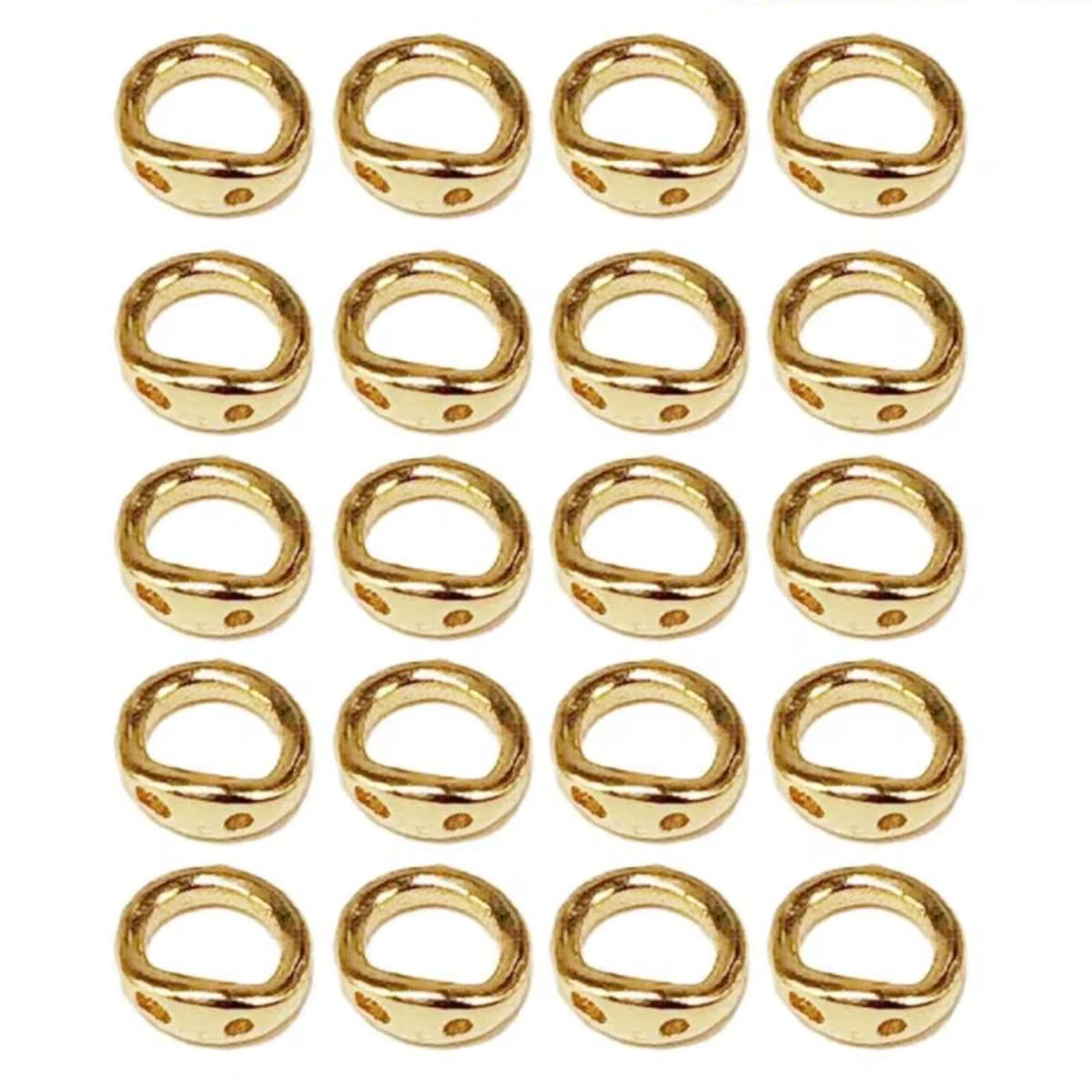 Grid of 20 18K gold double-hole connector rings, arranged in rows on a white background