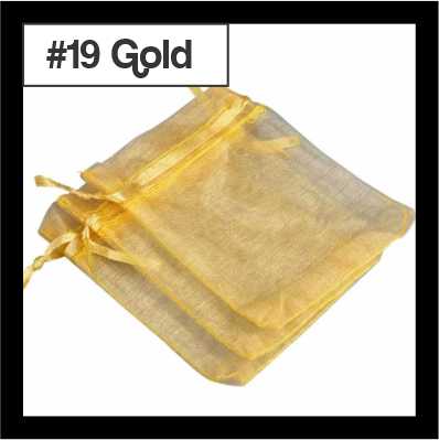 Sheer gold organza drawstring bags with satin ties, with a numbered colour label