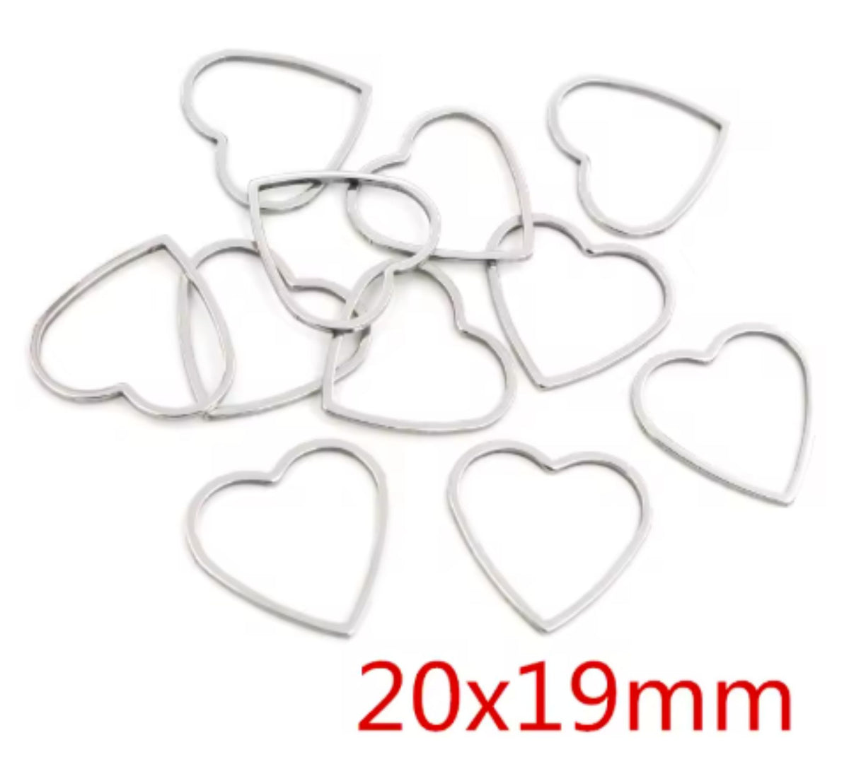 Pile of silver stainless steel open heart bezel frames, labelled 20 x 19mm