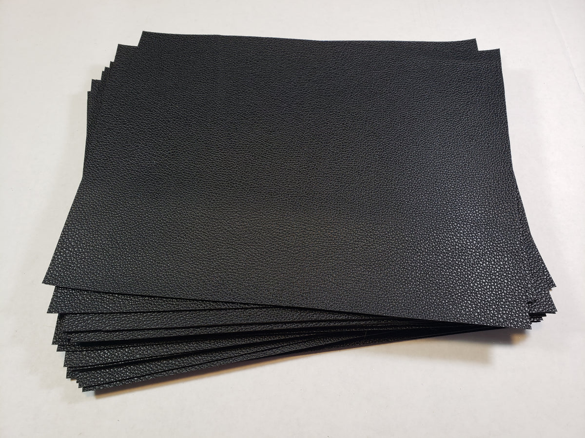 Stack of #1 black faux leather sheets with a pebbled grain texture