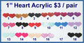 Eighteen pairs of 1 inch contour-cut acrylic heart cabochons (cabs) in glitter, marbled and solid colours