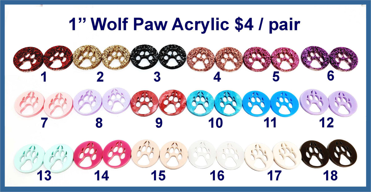 Eighteen pairs of 1 inch contour-cut acrylic wolf paw cabochons (cabs) in round frames, in glitter and solid colours