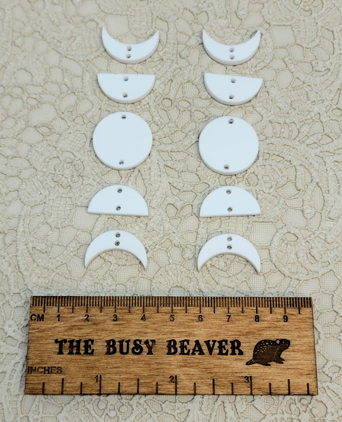 Two 5-tier acrylic moon phase sets in white: crescent, half and full moons beside a ruler