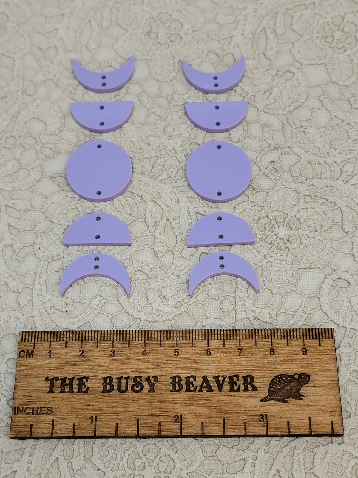 Two 5-tier acrylic moon phase sets in pastel purple: crescent, half and full moons beside a ruler