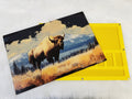 XLarge 8 x 11.5 inch magnetic-lid bead board with a bison and mountain print, lid beside its yellow velvet-flocked tray