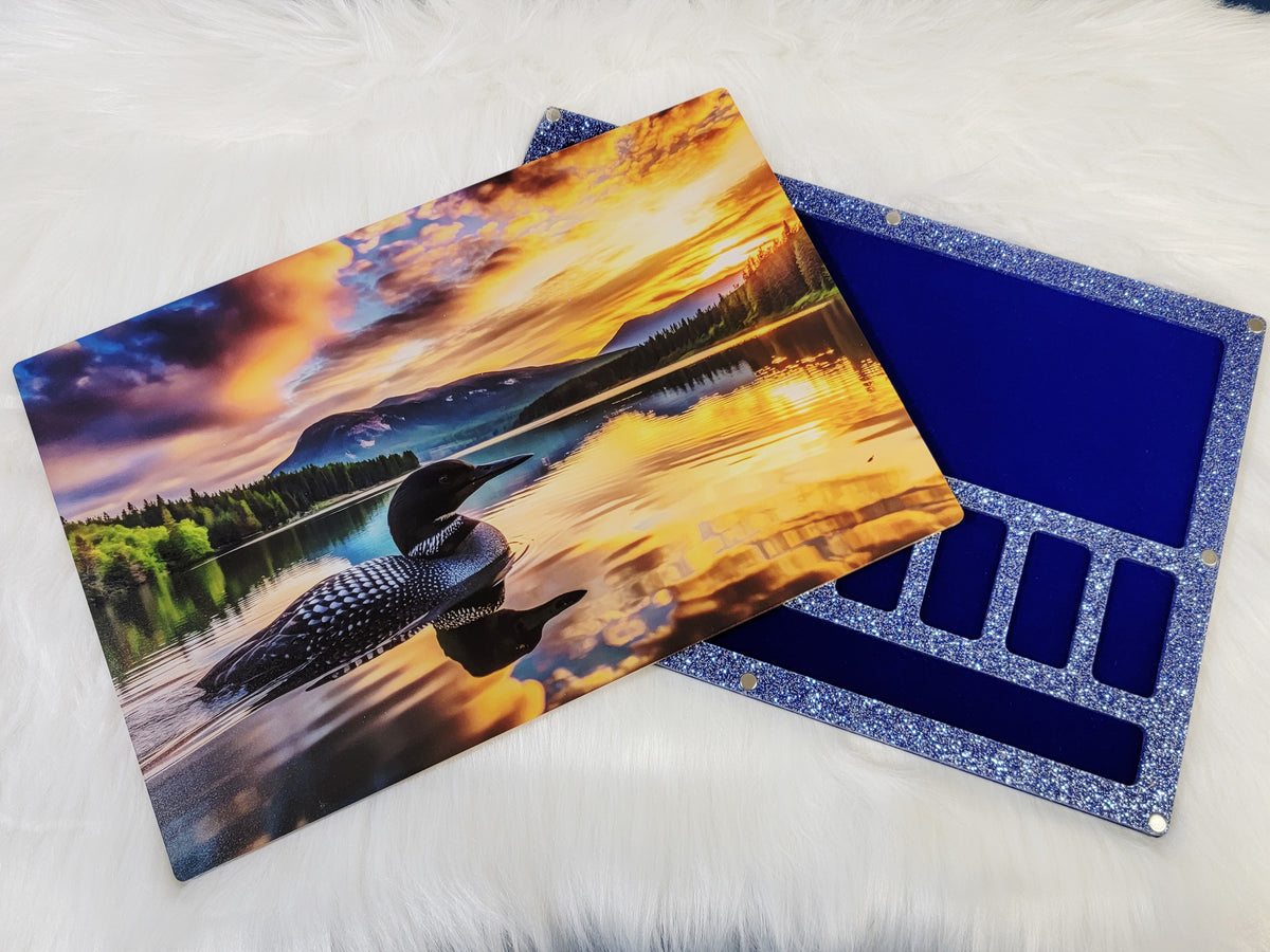 XLarge 8 x 11.5 inch magnetic-lid bead board with a loon on a sunset lake, lid beside its navy velvet-flocked tray