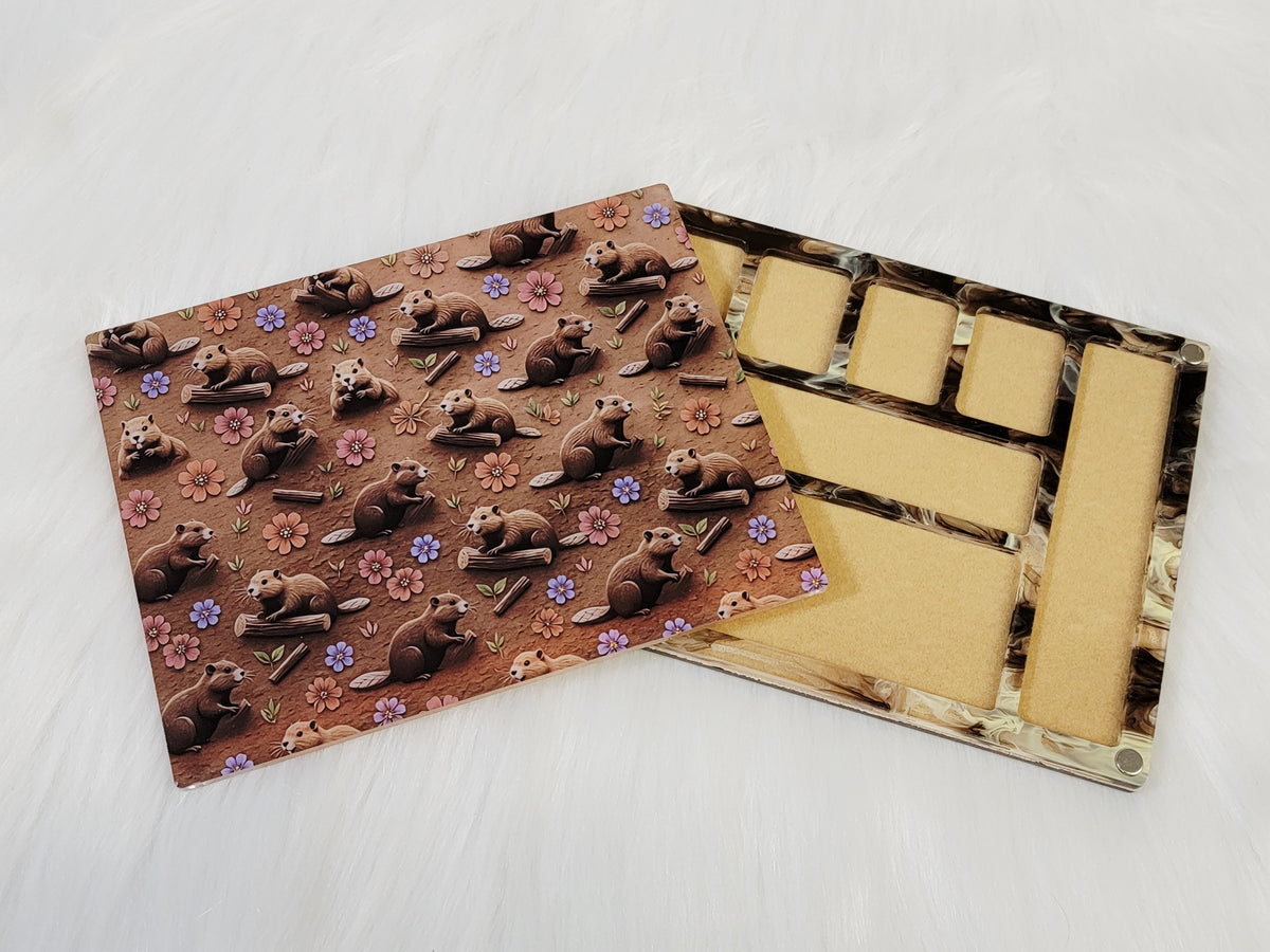 Same beaver-print bead board in the Medium 4.5 x 5.75 inch size, lid slid aside to show the tan velvet-flocked compartments