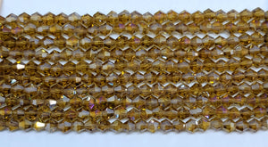 4mm Glass Bicone, Transparent Topaz AB