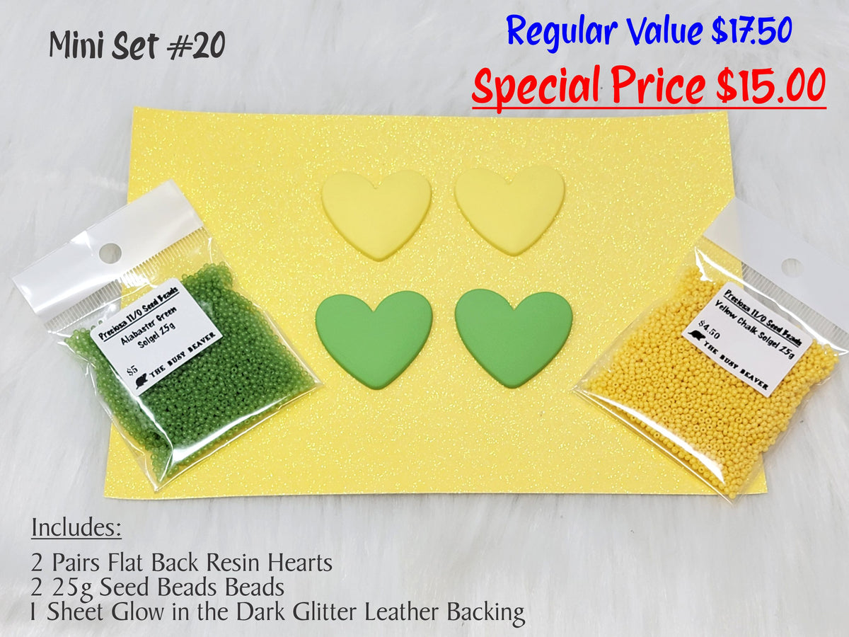 Mini set #20: yellow and green resin hearts, green and yellow seed beads, and a yellow glitter backing sheet