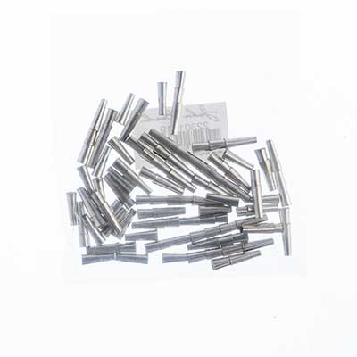 Pile of slim silver aluminum tube cones on a white background