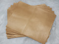 Stack of #22 champagne faux leather sheets with a metallic sheen