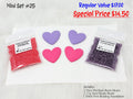 Mini set #25: lilac and pink resin hearts, coral and purple seed beads, and a white beading foundation