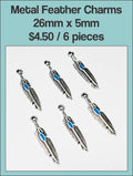 Six silver-tone 26 x 5mm feather charms with a turquoise-coloured stripe