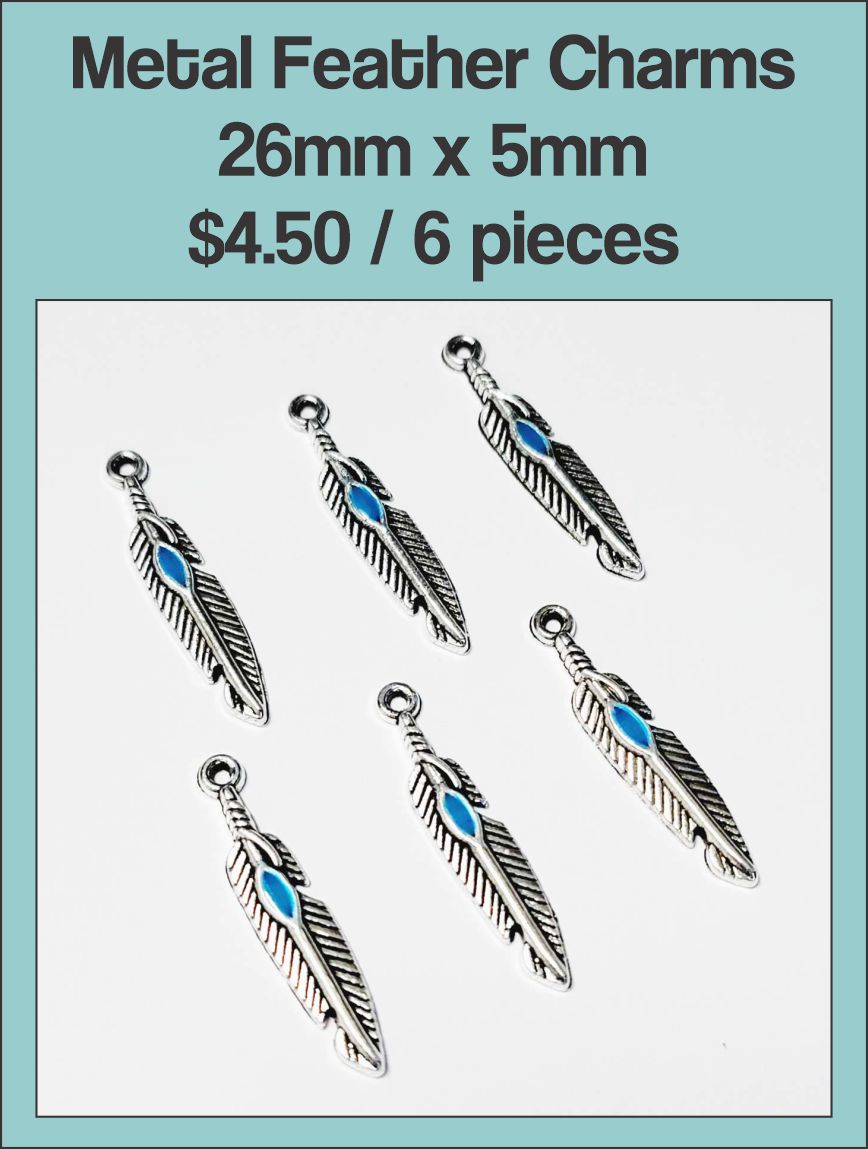 Six silver-tone 26 x 5mm feather charms with a turquoise-coloured stripe