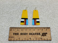 Pair of tapered resin slab inlay earrings, combo #28: yellow with black, white, red and blue