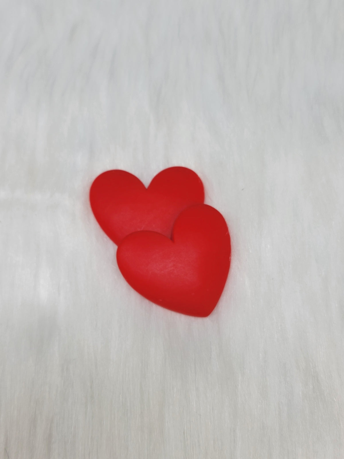 Pair of 37mm matte resin heart cabochons (cabs) in #2 Red on white faux fur