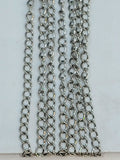 Hanging strands of 2 x 3mm rhodium stainless steel link chain