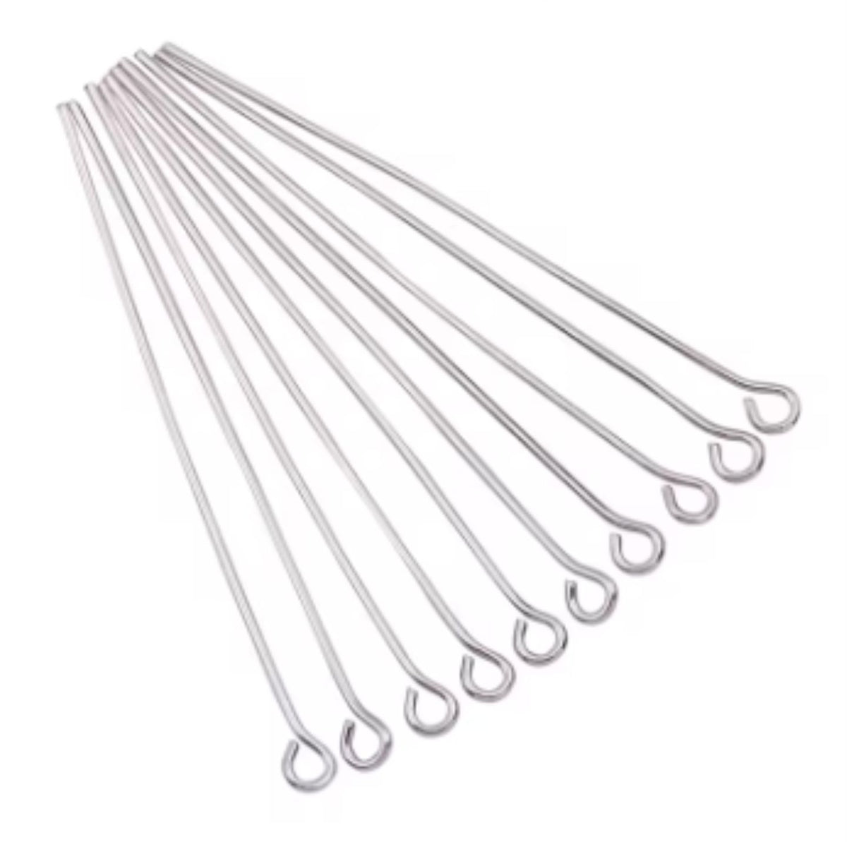 Fan of 30mm rhodium 20 gauge eye pins, each with a small round loop at one end, on white
