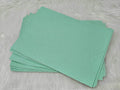 Stack of #31 blue glow-in-the-dark glitter faux leather sheets with a fine shimmer