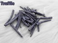 Pile of truffle dyed smooth dentalium shells, about 1.5 to 2 inches long, on white faux fur