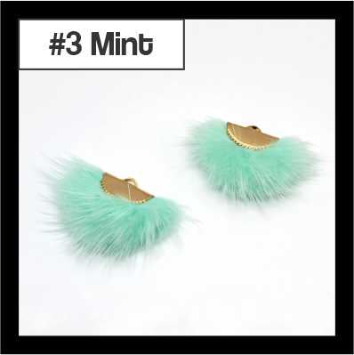 Pair of fan-shaped mint faux mink tassels with gold-tone caps, labelled #3