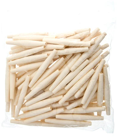 Loose pile of long white acrylic hairbone pipe beads on a white background
