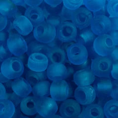 Close-up of 9mm glass crow beads in matte transparent blue, filling the frame