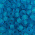 Close-up of 9mm glass crow beads in matte transparent sky blue
