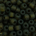 Close-up of 9mm glass crow beads in matte transparent kiwi, filling the frame